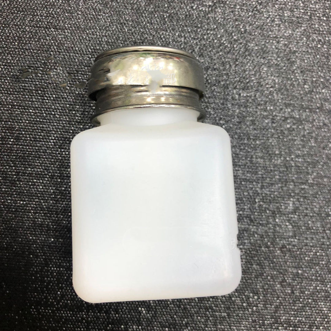 Alcohol bottle press type water outlet alcohol pot